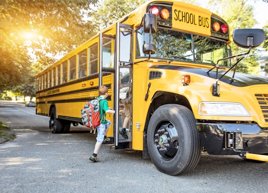 Children board a schoolbus, which may be soon replaced by a new low or no-emissions bus thanks to an...