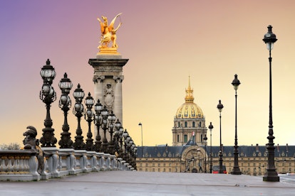 Beautiful sunrise at the Pont Alexandre III and Les Invalides in Paris