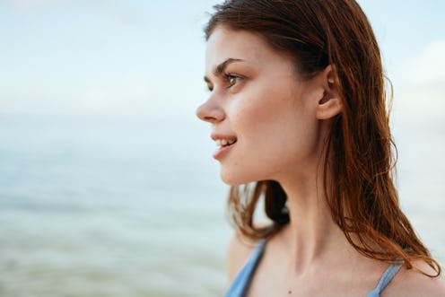   woman on the background of the ocean nature                            