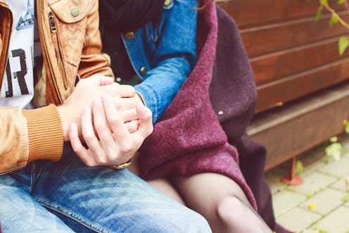 couple hugging and holding hands