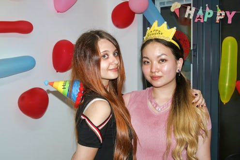 Two Beautiful Young Girls Celebrating Birthday,white girls,european girls,blonde haired girl, red ha...