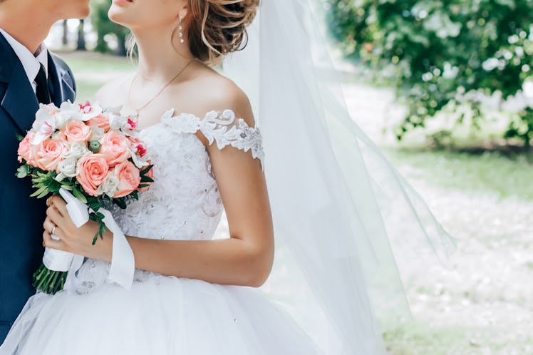 Bride with a bouquet in hands
