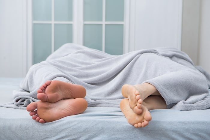 Feet in bed 