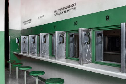 interior jail prison visiting row behind the glass