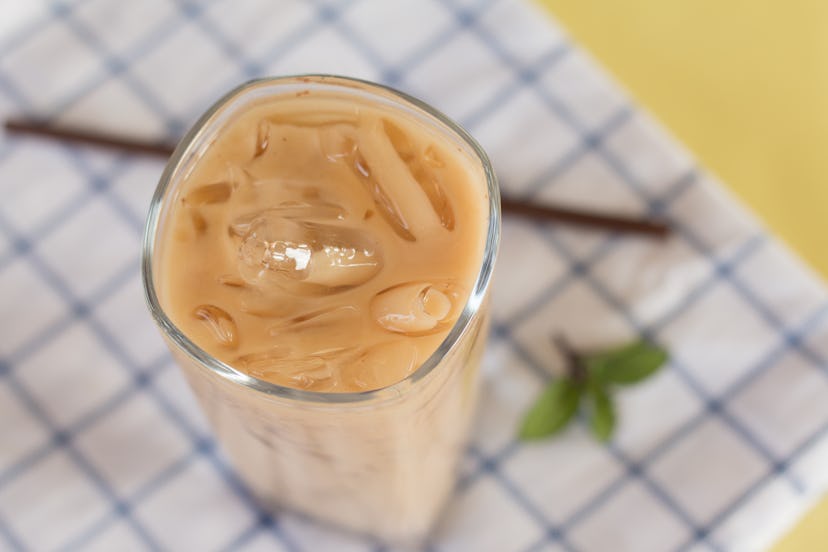 Close up of Iced coffee with straw.