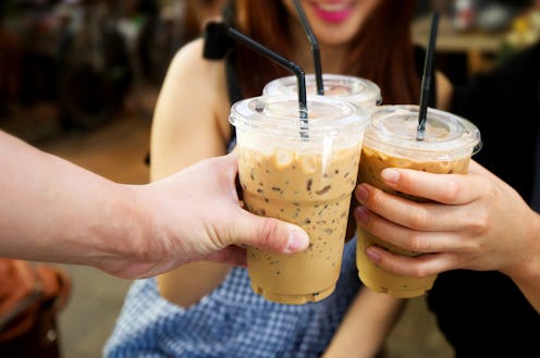 Ice coffee and people meeting friendship togetherness coffee shop concept.