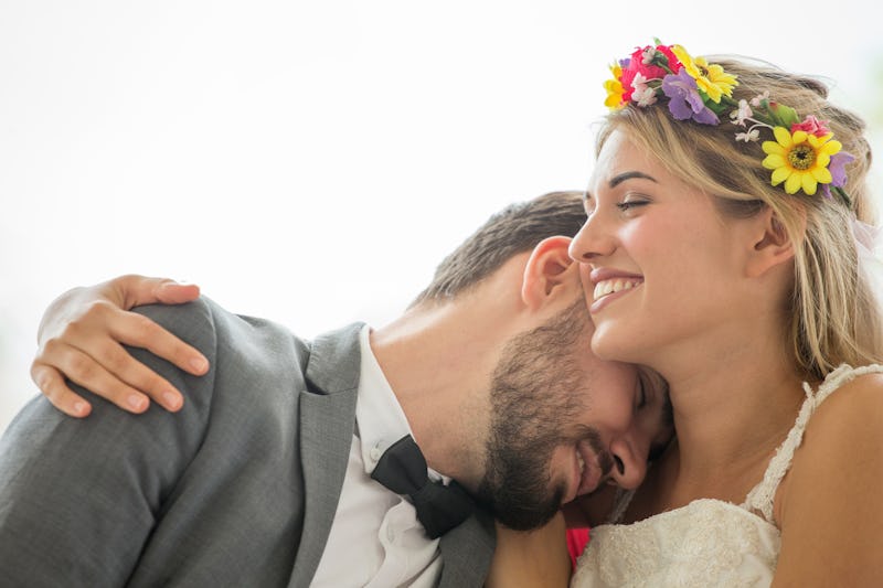 young couple in love Wedding Bride and groom embracing together on white background . Newlyweds. Clo...