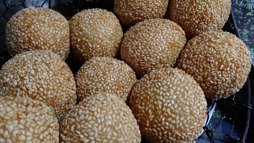 Onde-onde is traditional cake made from glutinous rice and sugar serve with sesame seed