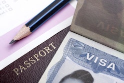 Passport and US visa background with immigration application form.