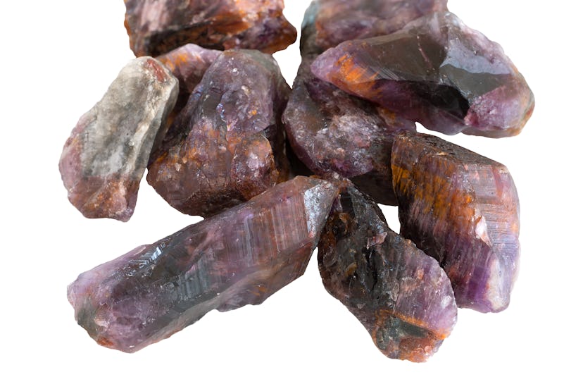 Amethyst Cacoxenite or Melody Stones isolated on white background