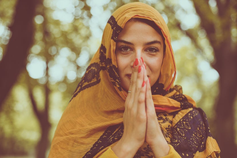Religious woman praying . Muslim. 