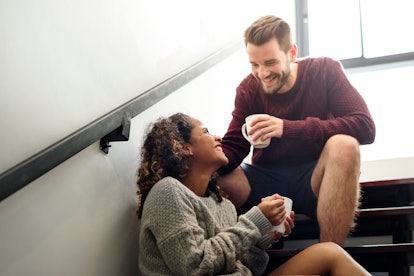 Cheerful young couple is talking