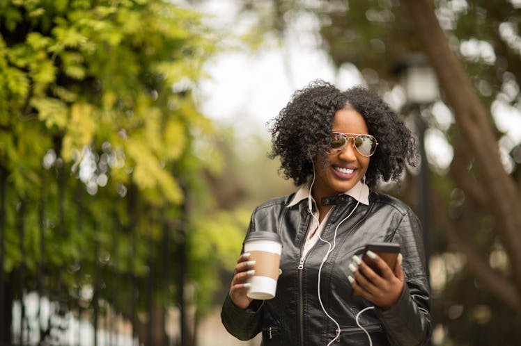 Woman texting and talking on the phone.