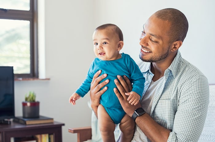 Helping distract baby during a time they'd normally breastfeed is a great way for dads to get involv...