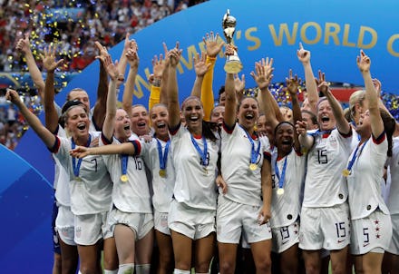 United States' team celebrates with trophy after winning the Women's World Cup final soccer match be...
