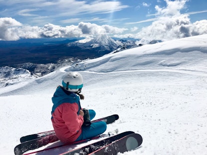 Female Skier Looks Out at Beautiful Panorama of Mt Ngauruhoe from Mt Ruapehu, New Zealand