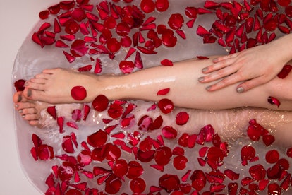 Valentines day bath with rose petails, woman in home spa, romantic luxury self care