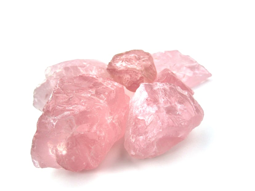 Rose quartz rough stone,gemstone,isolated on white background