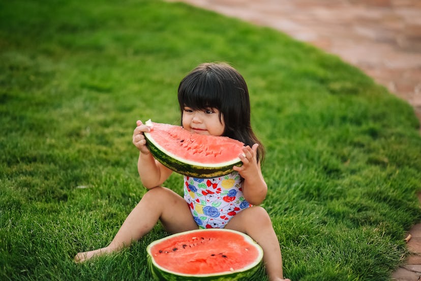 
girl eats watermelon, summer season watermelons