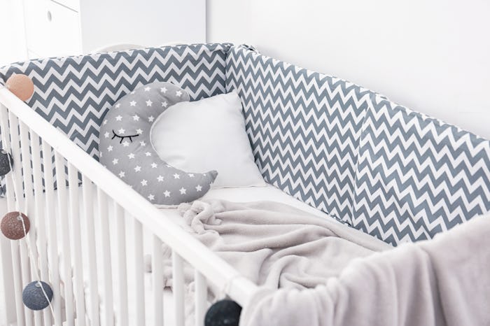 Comfortable crib in baby room. Idea for interior design