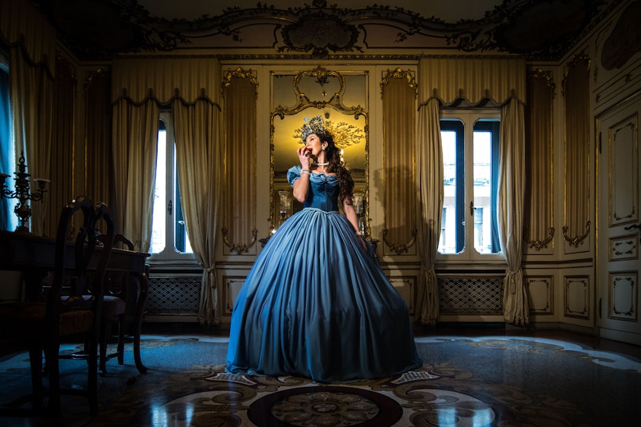A model poses at the hystorical Ca' Nigra Palace, wearing a Cinderella costume of the 1800s made wit...