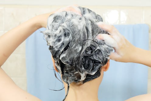 Woman washing her hair.