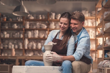 Young couple on a romantic date in pottery