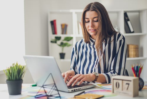 Young perspective web designer and blogger in modern office