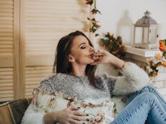 Portrait of a girl in the winter in the house.