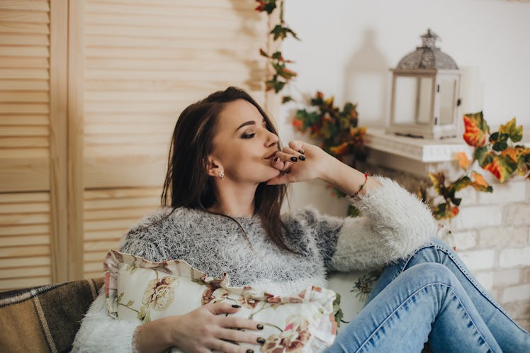Portrait of a girl in the winter in the house.