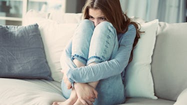 Portrait of thoughtful young woman