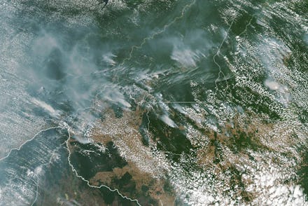 A handout photo made available by NASA of a satellite image showing several fires burning in the Bra...