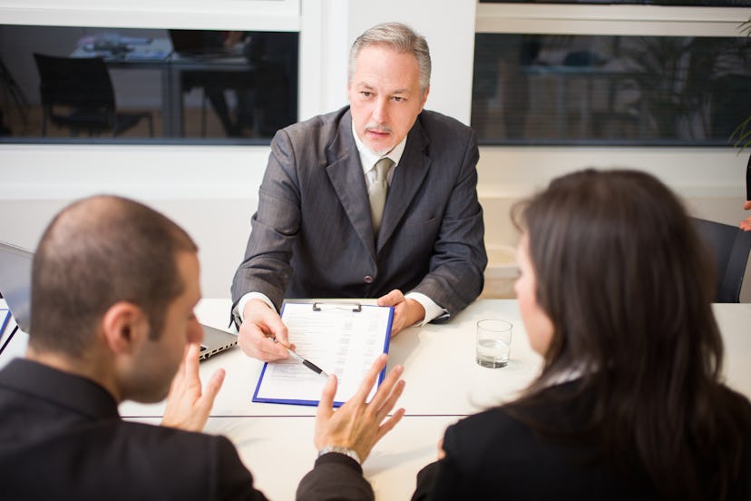 People at work in their office