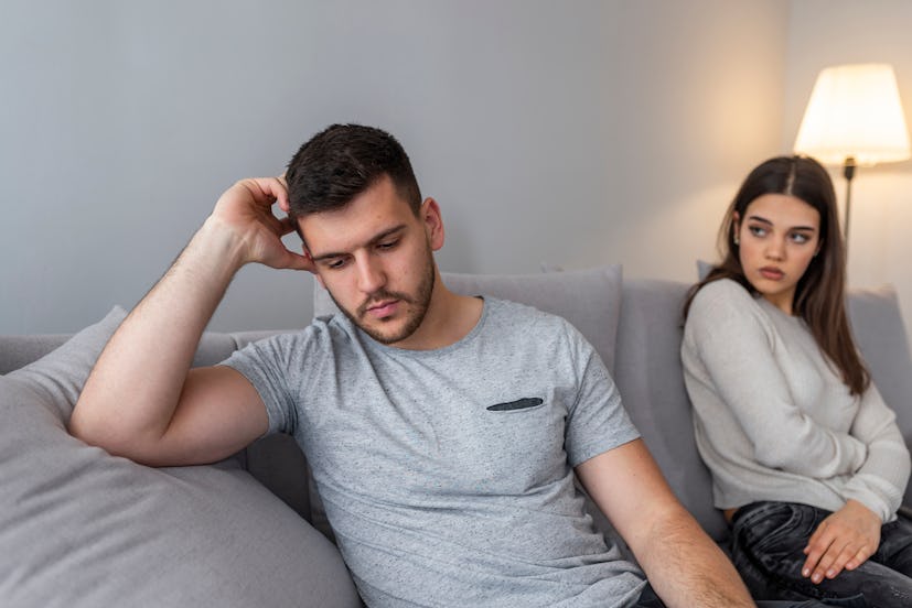 Angry unhappy young couple ignoring not looking at each other after family fight or quarrel, upset t...