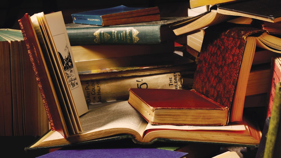A Pile Of Vintage Leather-bound Books