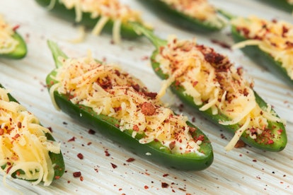 Cooking fresh fried jalapeno poppers with cheese