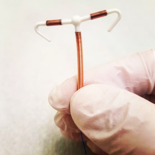 Contraceptive. Copper IUD.
Birth control. copper IUD contraception.
Sex education. hands. care