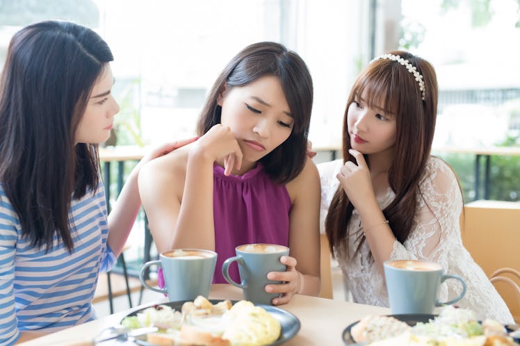 woman friends sit and feel upset in the restaurant