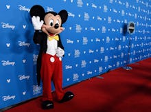 Mickey Mouse waves to members of the media at the Disney Legends press line during the 2019 D23 Expo...