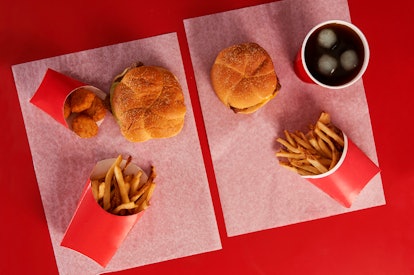 Top view of two wendy´s burgers and fries combos from above