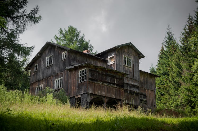 Old, abandoned hostel on a mountain trail