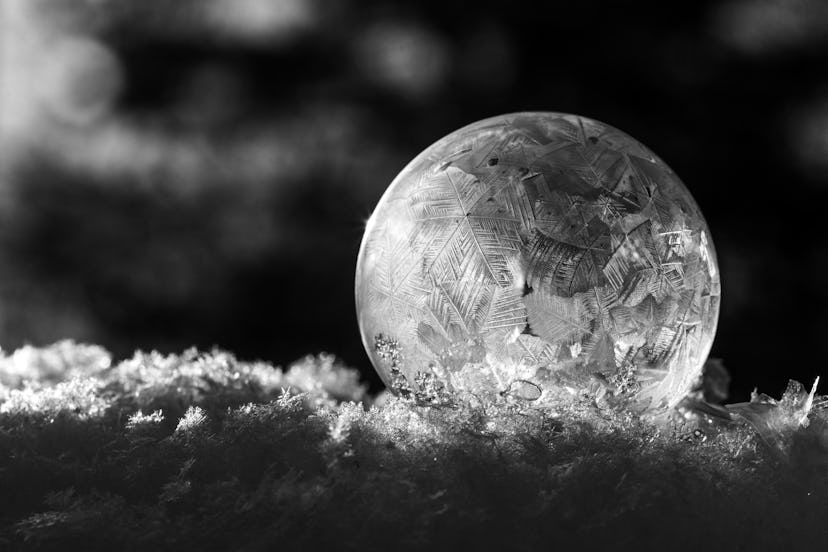 Blowing soap bubbles outside when it's below freezing can result in frozen bubbles.