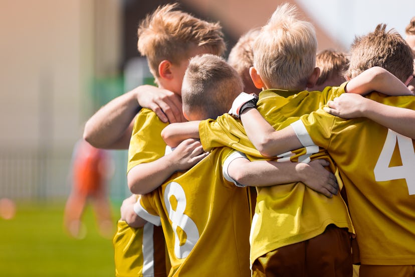 Kid Soccer Football Team Huddle. Children Play Sport Game. Children Sporty Team United Ready to Play...