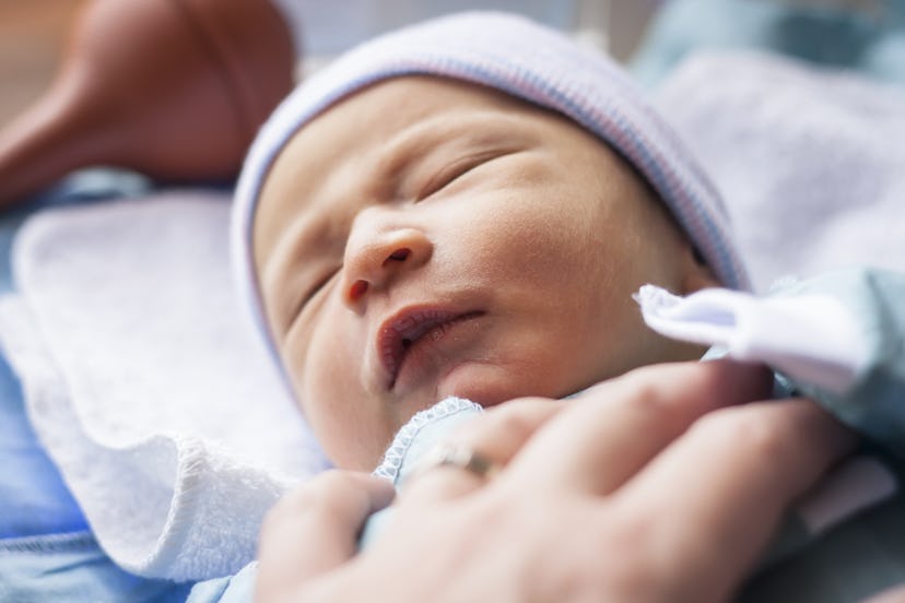 Healthy Newborn Infant Baby Boy Sleeping in Hospital 