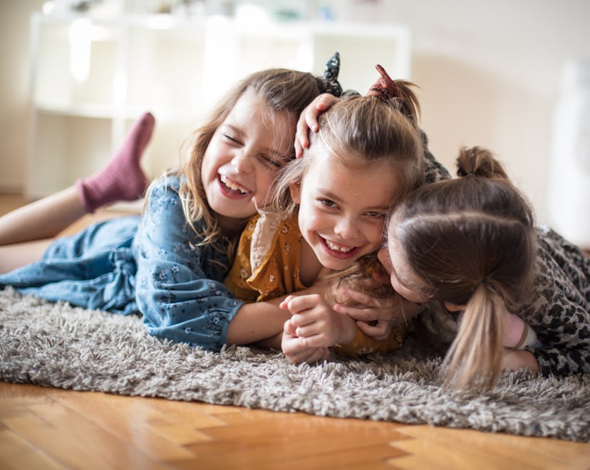 The greatest love is for the sister. Three little girls at home.