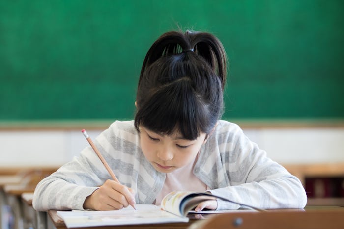 Girl studying in a classroom