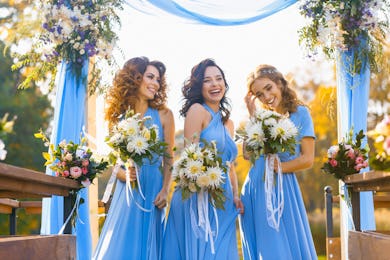 Bridesmaids in park on the wedding day