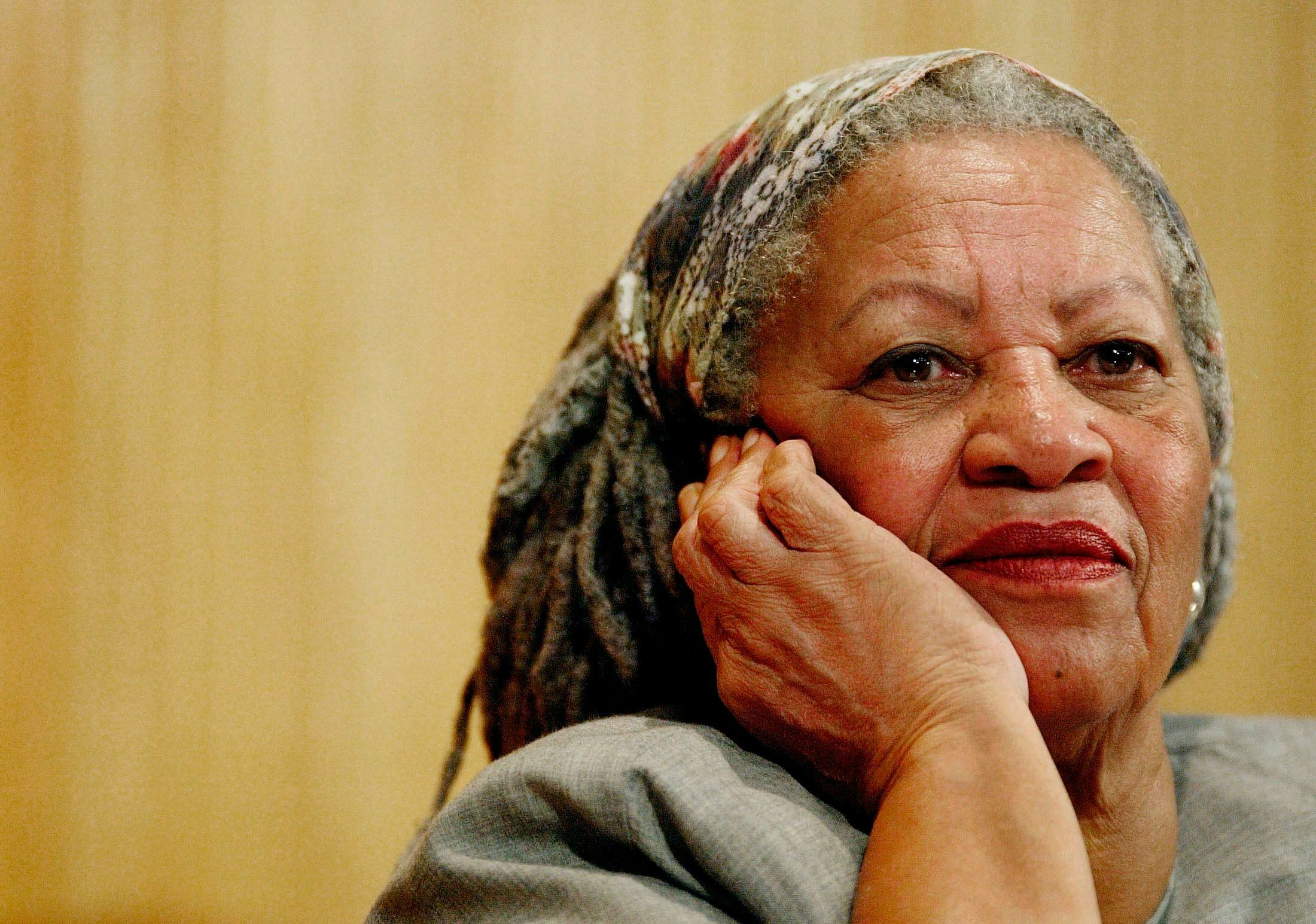TONI MORRISON. Author Toni Morrison listens to Mexicos Carlos Monsivais during the Julio Cortazar pr...