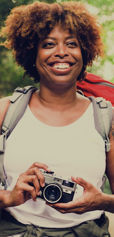 Woman with an analog camera