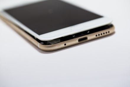 Battery damage: Close-up photos showing process of mobile phone repair